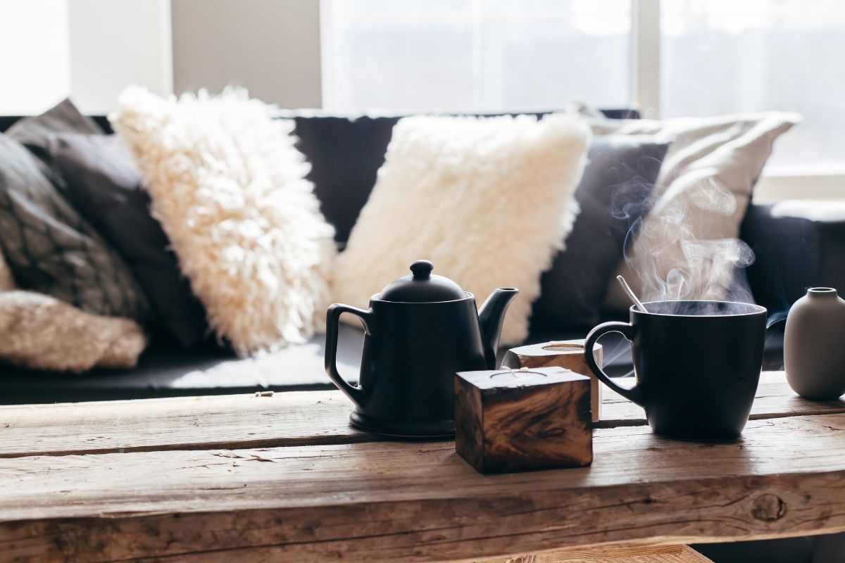 tea and tea pot sitting on table 